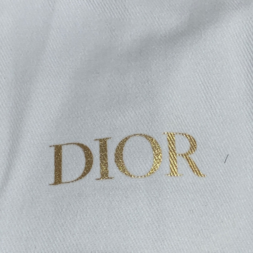 Authentic brand new Dior pouch with strings, must have for collectors/travellers